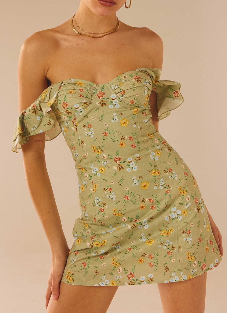 Womens The Chateau Mini Dress in the colour Sage Floral in front of a light grey background