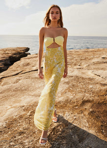 Womens Tropicana Maxi Dress in the colour Daffodil in front of a light grey background