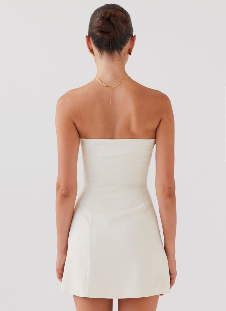 Womens Ayanna Strapless Mini Dress in the colour Ivory in front of a light grey background