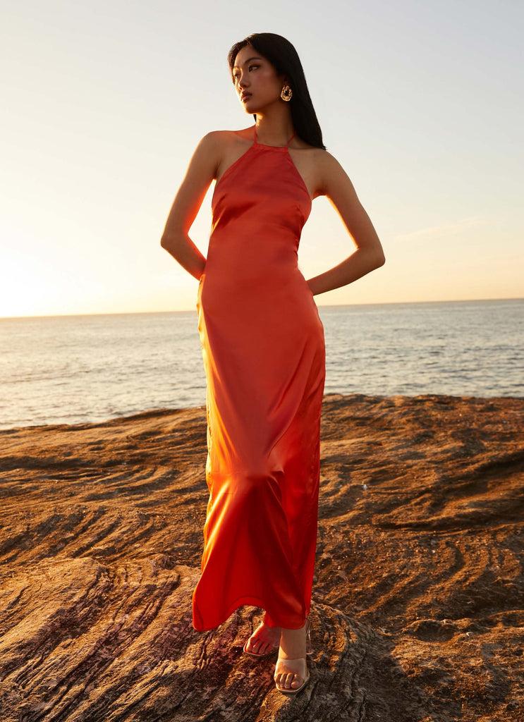 Womens Melody Day Halterneck Maxi Dress in the colour Tangerine in front of a light grey background