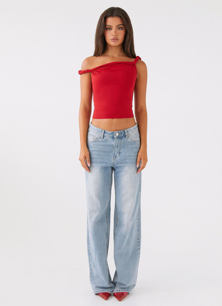 Womens Solace Soul Twist Shoulder Top in the colour Red in front of a light grey background