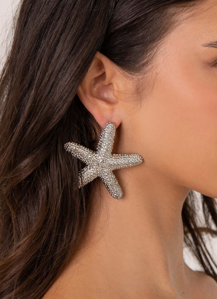 Womens Geneve Starfish Earring in the colour Silver in front of a light grey background