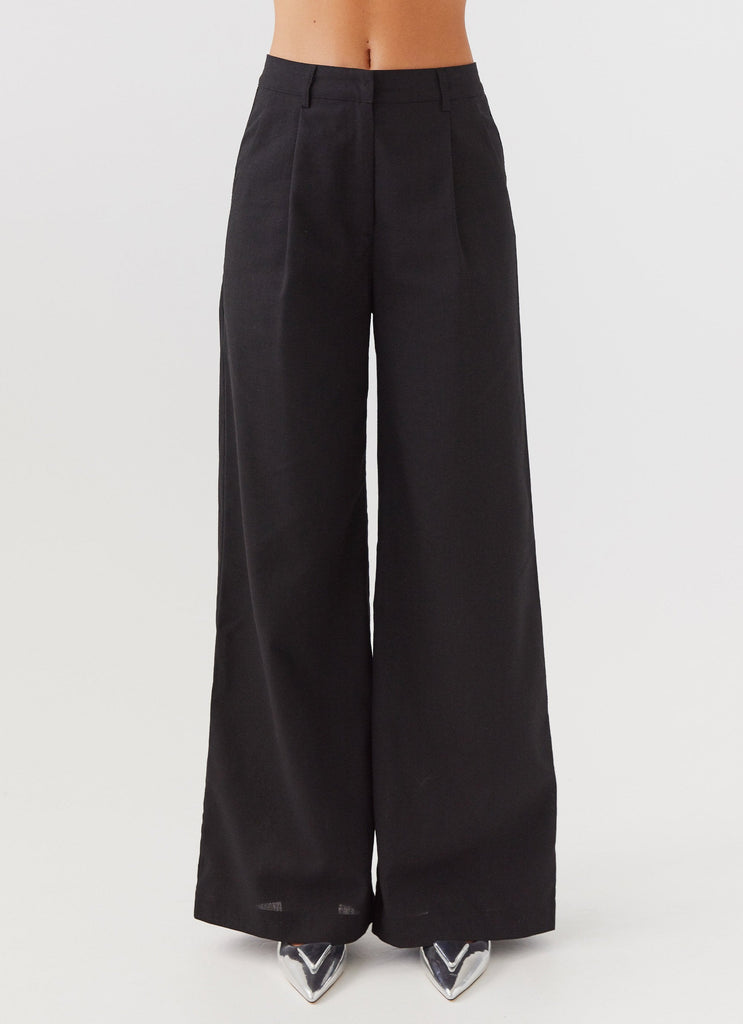 Womens Heatwave Linen Wide Leg Pants in the colour Black in front of a light grey background