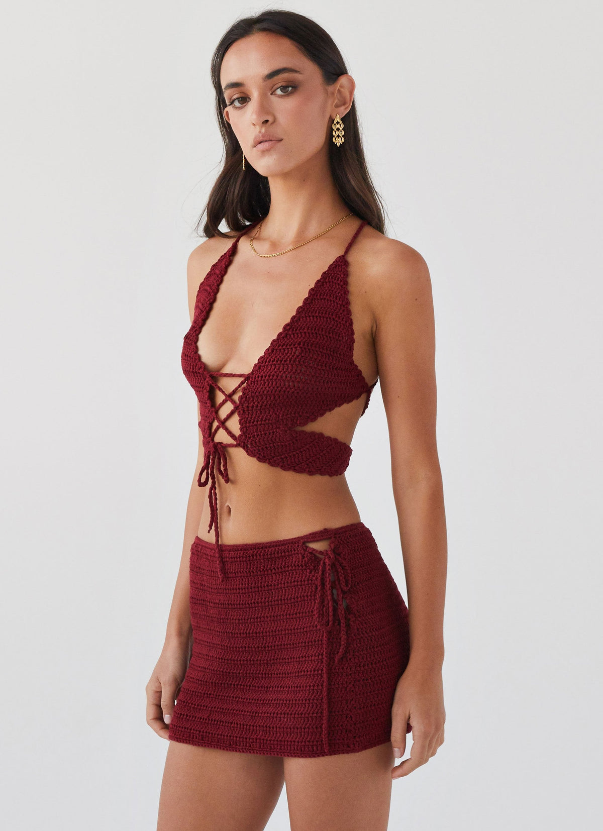 Womens Wild Hearts Crochet Tie Top in the colour Cherry Rose in front of a light grey background