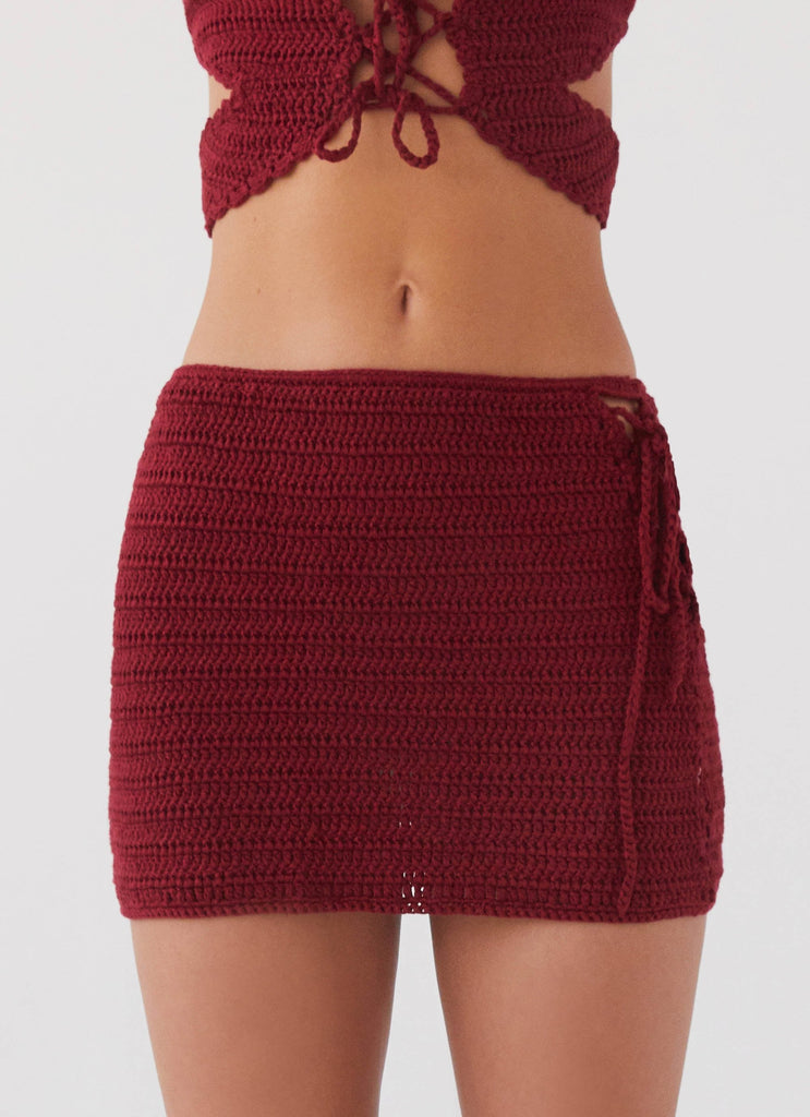 Womens Wild Hearts Crochet Mini Skirt in the colour Cherry Rose in front of a light grey background