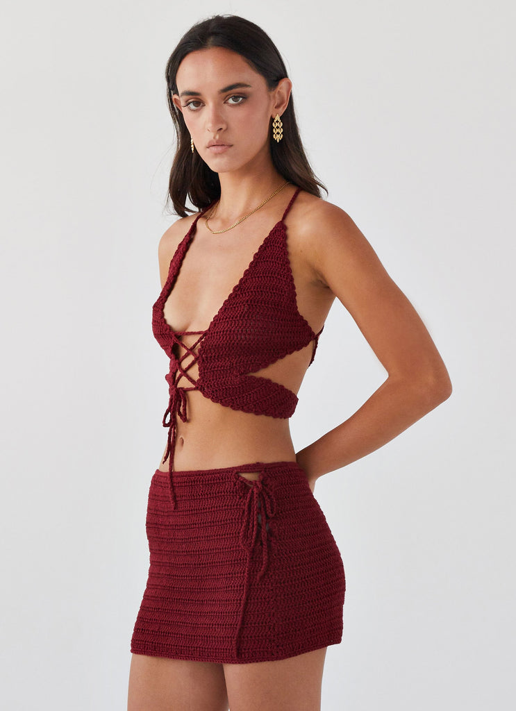 Womens Wild Hearts Crochet Mini Skirt in the colour Cherry Rose in front of a light grey background