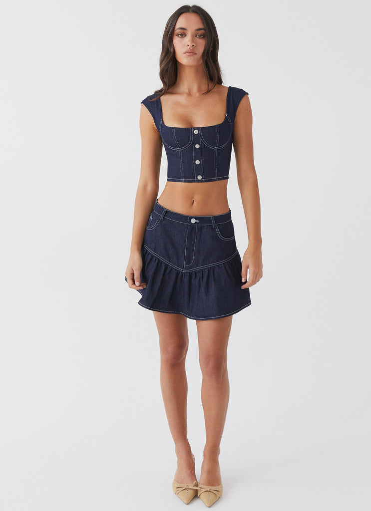 Womens Marielle Denim Mini Skirt in the colour Indigo in front of a light grey background