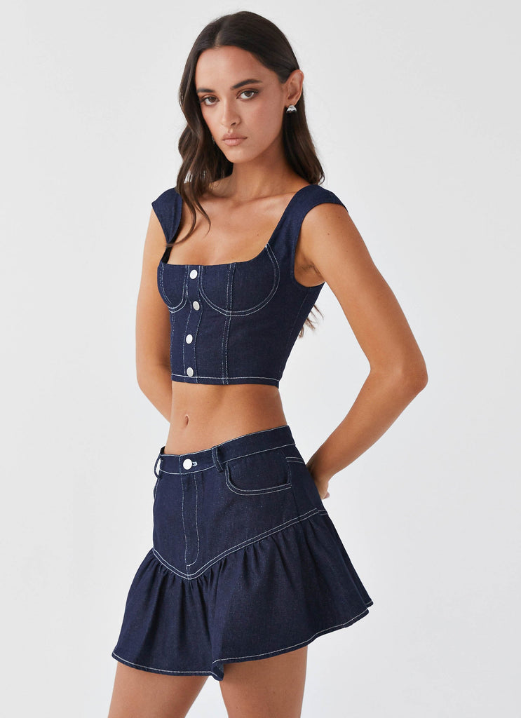 Womens Marielle Denim Mini Skirt in the colour Indigo in front of a light grey background