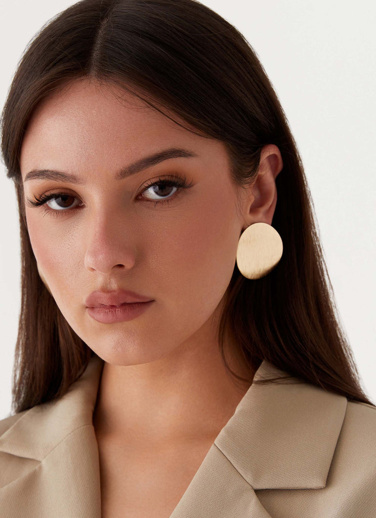 Womens Runway Hit Earrings in the colour Gold in front of a light grey background