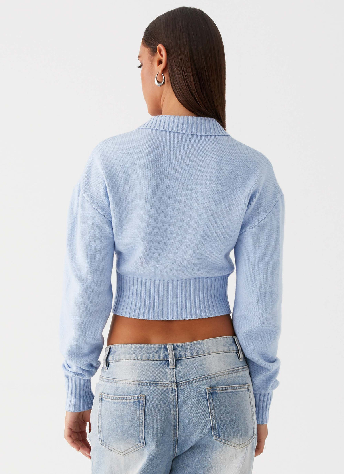 Womens Sable Cardigan in the colour Sky Blue in front of a light grey background