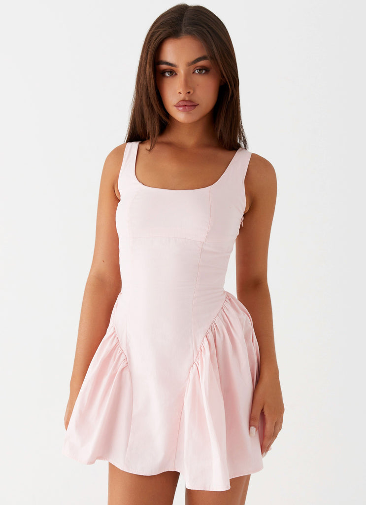 Womens Sassy Soiree Corset Mini Dress in the colour Pink in front of a light grey background