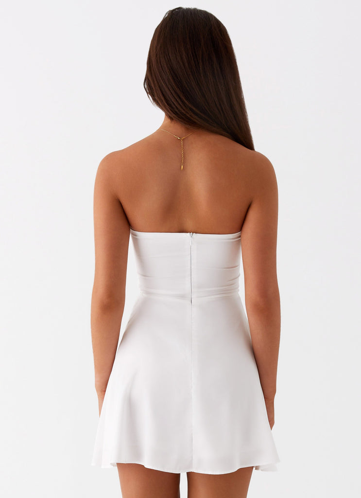 Womens Taga Twist Mini Dress in the colour White in front of a light grey background